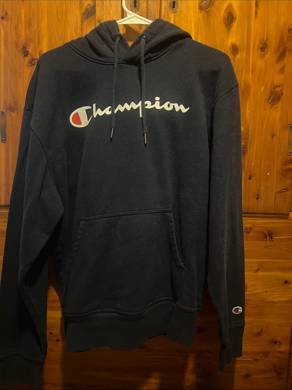 Champion Black Hoodie with White Script and Red Logo Accent